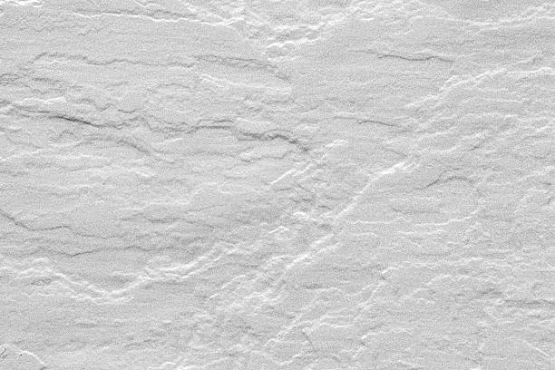 istock Close - up warm white limestone texture and background 513098907