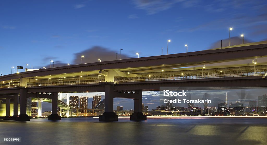 Tokyo Bay at Rainbow Bridge and tokyo tower Architecture Stock Photo