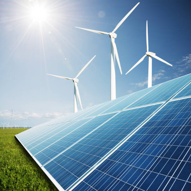 istock solar panels and windmill power plant 513099481