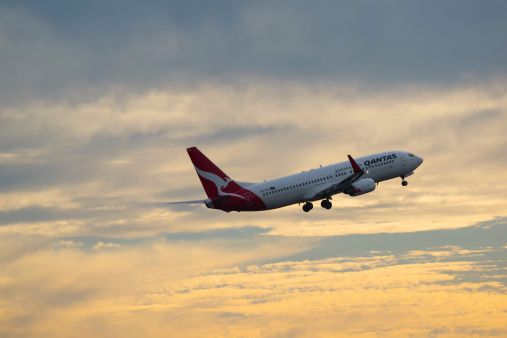  Sydney Australia May 27, 2014 passenger aircraft Boeing 737-800 in Virgin colour scheme taking off from Kingsford Smith airport, the plane is bound for Gold Coast Queensland