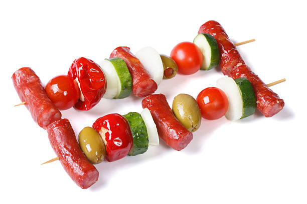 istock grilled sausages with vegetables on skewers isolated 513100955