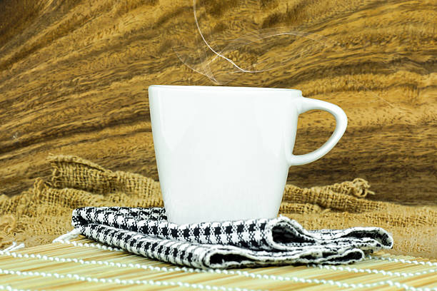 istock Coffee cup and saucer on a wooden. 513102243