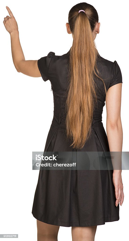 Woman touching virtual button. Rear view Woman touching virtual button. Rear view. Isolated on white background Computer Monitor Stock Photo