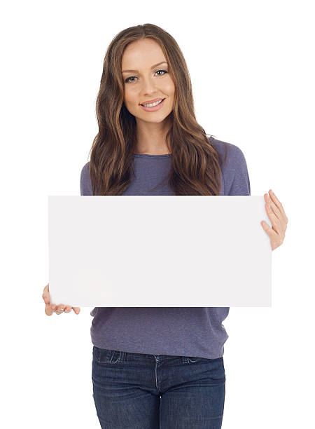 istock Cheerful young woman with banner 513103086