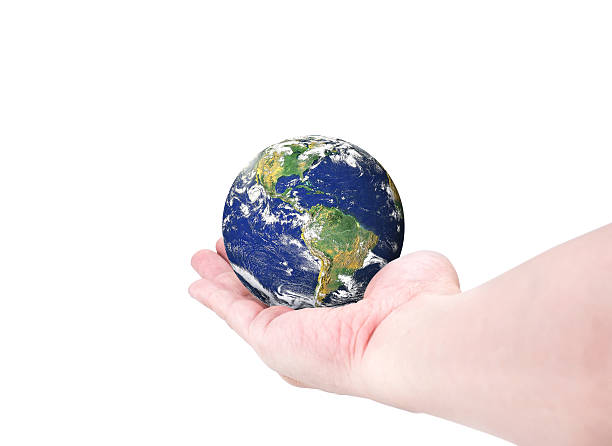 istock globe on woman hand isolated on white background 513103668