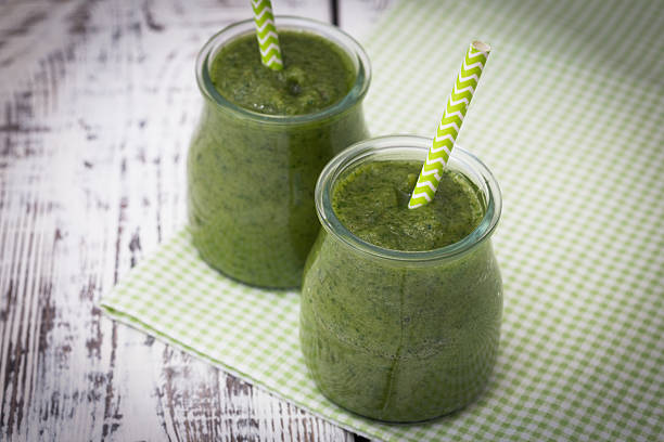 istock Green smoothie with apple,banana and spinach 513104474