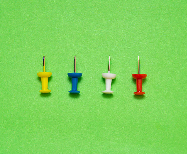 istock Set of push pins in different colors, isolated 513104528