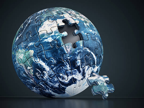 Earth Consisting Of Puzzle Pieces Stock Photo - Download Image Now