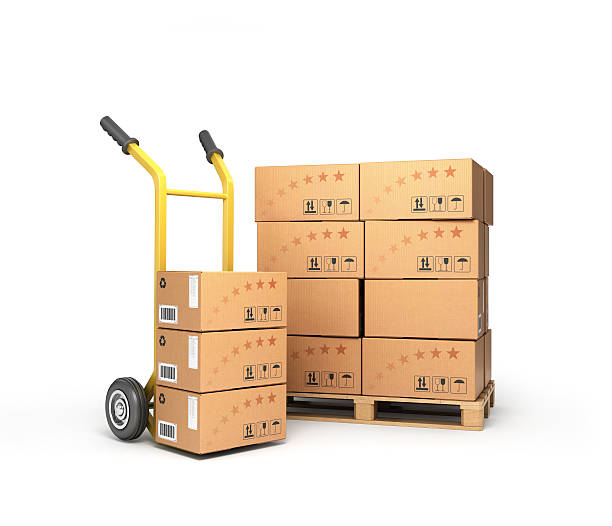 istock boxes lie on a pallet near the handcart 513107716