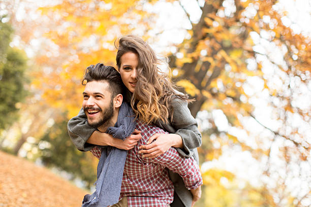 istock Young couple in the autumn forest 513108206