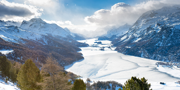 The valley of Engadine St. Moritz Switzerland with frozen lakes