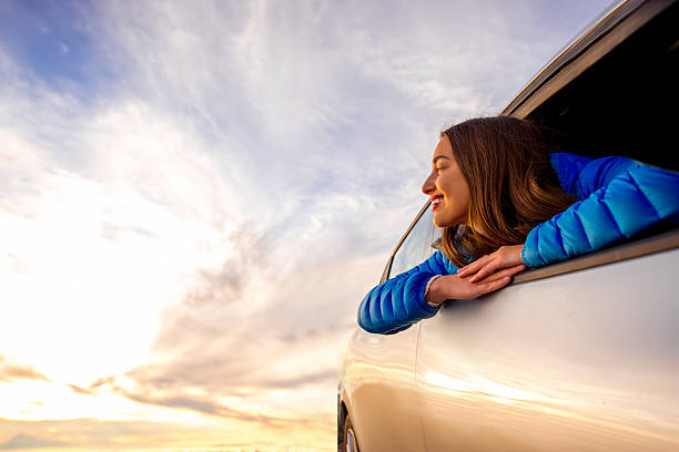 istock Woman enjoying beautiful cloudscape 513109602