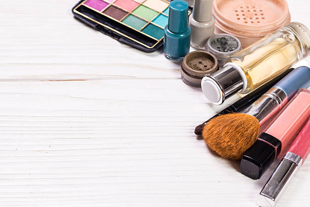 istock Various makeup products on wooden background with copyspace 513112202
