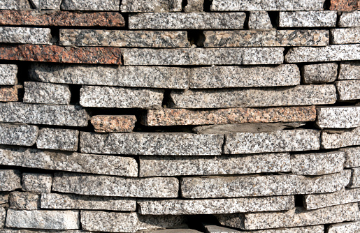 Wall made of stones. Architectural background and texture.