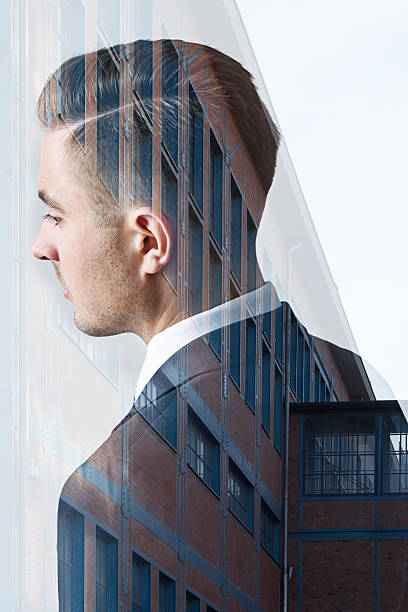 istock Man of success and building 513114250