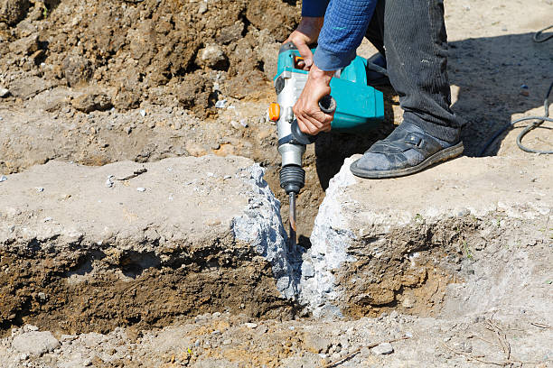 istock Worker hammer smashes the concrete foundation 513114276