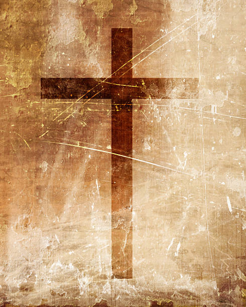 istock Christian cross on paper background 513114448