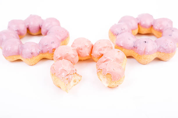 três dónute isolado num segundo plano. pastel cores - remote fat overweight dieting imagens e fotografias de stock