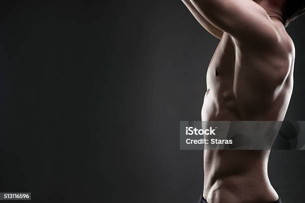 Handsome Muscular Bodybuilder Posing On Gray Background Stock Photo - Download Image Now