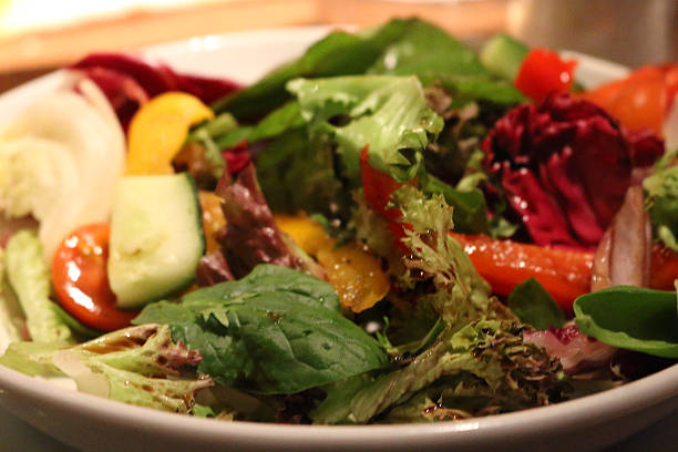 istock Image of mixed salad with balsamic and olive oil dressing 513117658