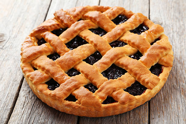istock Homemade pie on grey wooden background 513118452