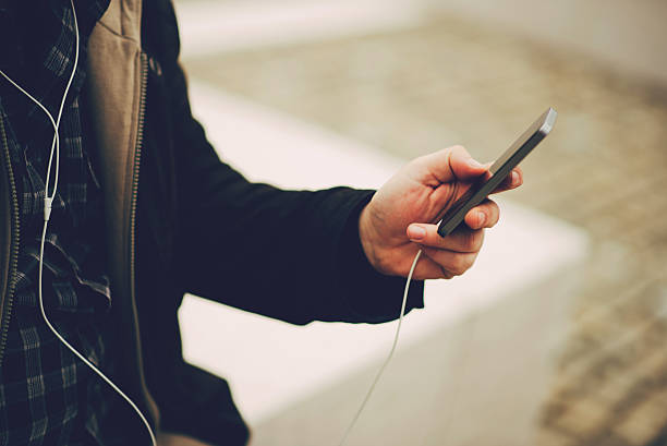 istock cell phone in the man hand 513119108