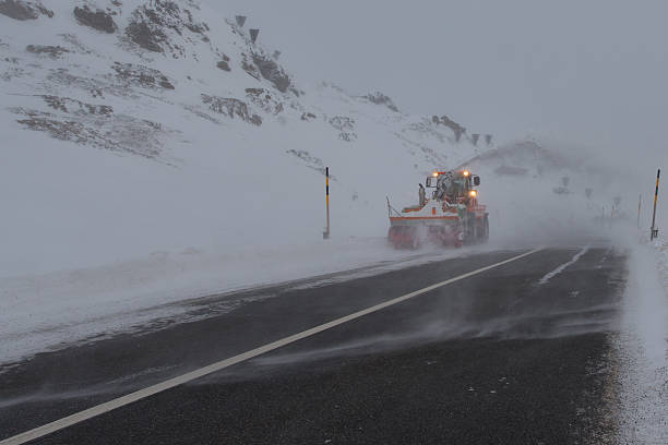 istock Snowplow in mountain road 513120844