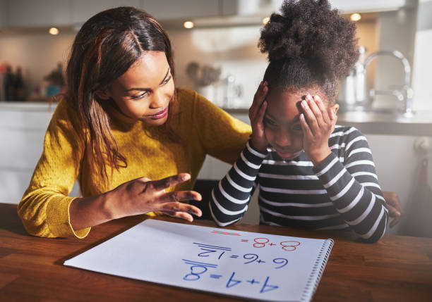 istock Mother learning her daughter to calculate 513121298