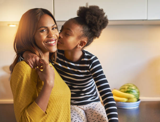 istock Black mom and daughter loving each other 513121568