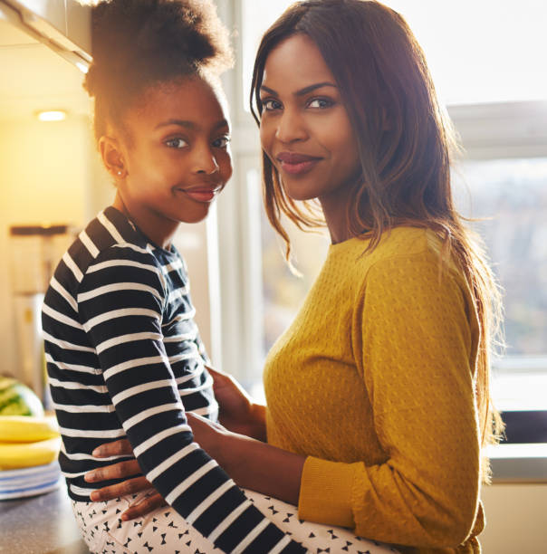 istock Black woman and her daughter 513121968