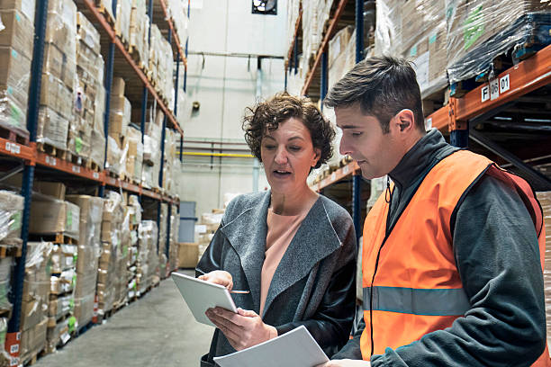istock Supervisor talking with worker about the new products 513122218