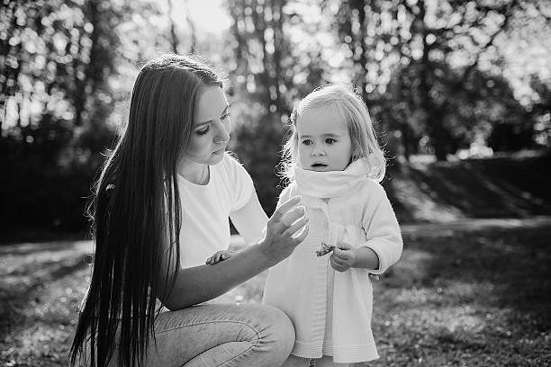 istock young family walking in the park 513123384