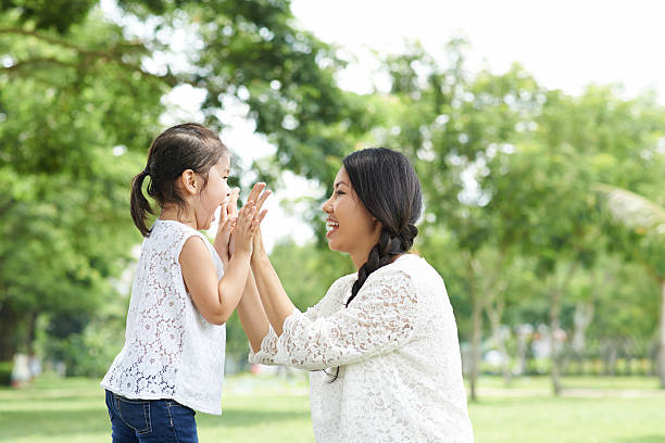 Clapping Mother 900+ Mom Clapping With Baby Stock Photos, Pictures & Royalty-Free ...