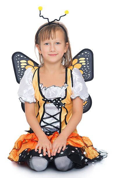 istock Girl wearing a butterfly costume 513125832