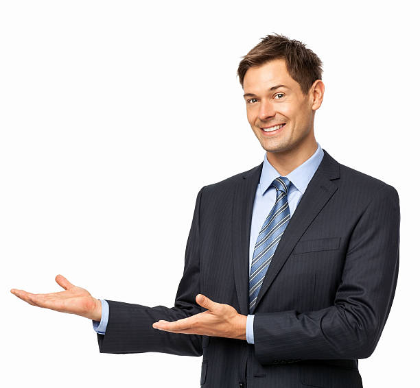 istock Businessman Presenting Against White Background 513125944