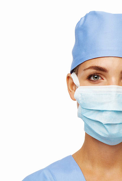 istock Doctor Wearing Surgical Mask 513126978