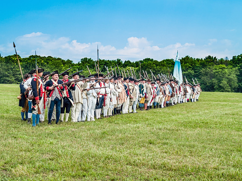 Freehold, NJ, USA - June 20, 2008: Men dressed up as the Continental Army for the Battle of Monmouth reenactment at Monmouth Battlefield State Park in Freehold NJ.