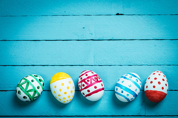 istock Easter concept with colorful eggs on wooden background 513129512