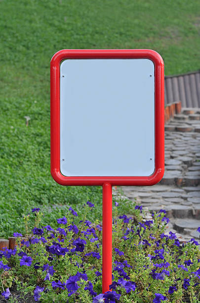 istock Bulletin board with red frame on a background of grass 513129670