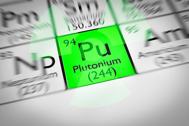 Focus on radioactive green Plutonium Chemical Element stock photo