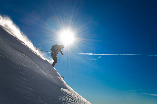istock Cross country skiing during the descent in deep snow 513133274