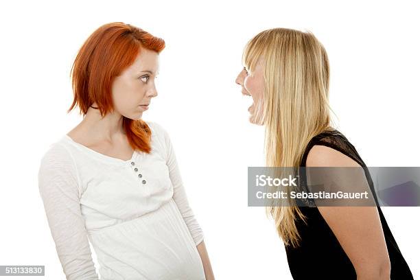 Young Beautiful Red And Blond Haired Girls Is Sorry Fighting Stock Photo - Download Image Now