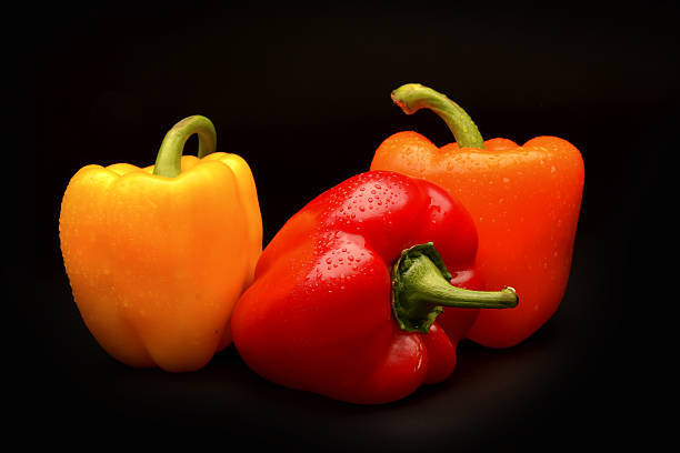 Sweet pepper on black background stock photo