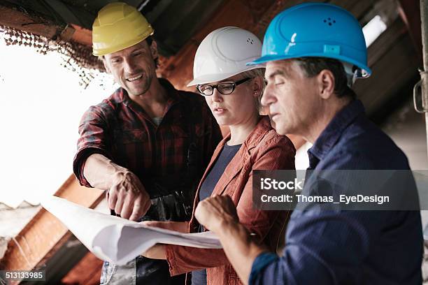 Construction Foreman With Blueprints Stock Photo - Download Image Now - 25-29 Years, 35-39 Years, Adult