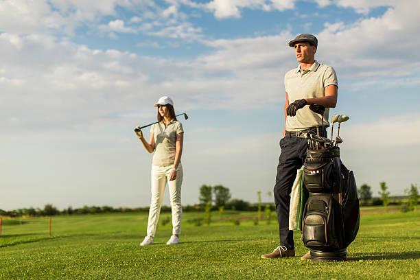 istock Young couple at golf cart 513135417