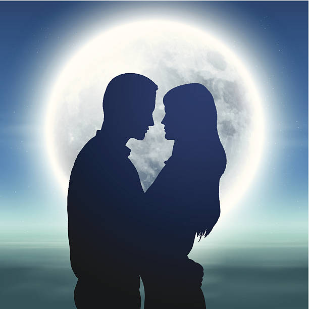 istock Sea with full moon and silhouette couple at night 513136473