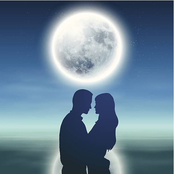 istock Sea with full moon and silhouette couple at night 513136545