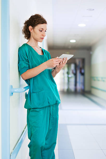 istock Nurse walking in a hospital corridor 513137369