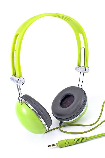 istock Green headphones isolated on white 513137969