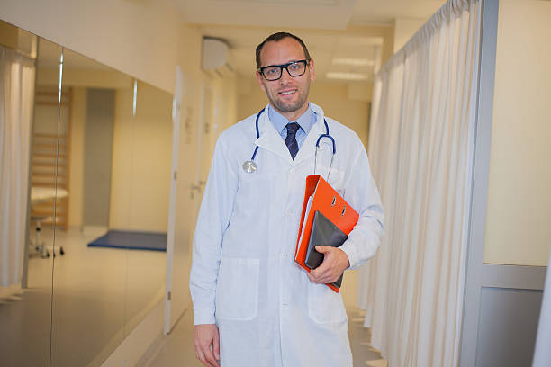 istock Doctor with notes in a modern hospital. 513140505